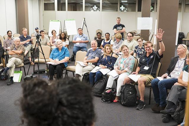 Fellow raising a hand at Fellowship training