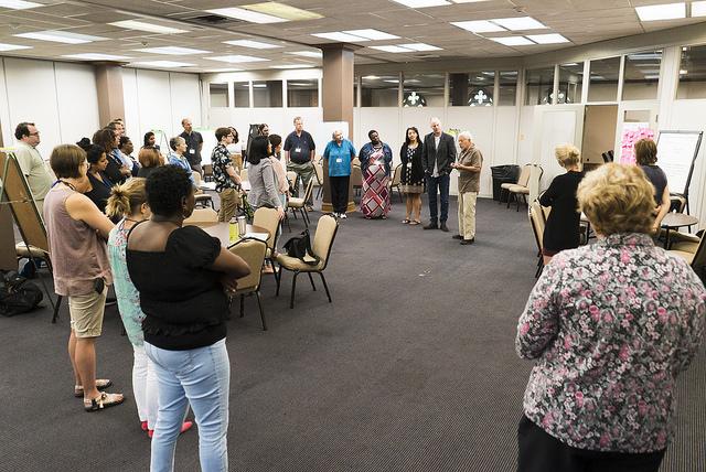 We Own It Fellows in a circle at Nashville training