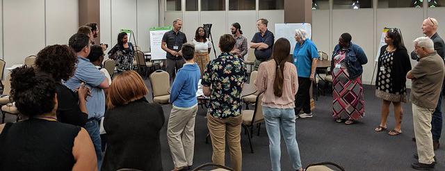 Fellows in a circle at training