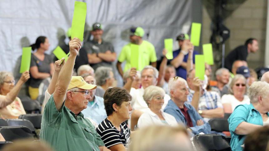 Member-owners vote on advisory motions at Crow Wing Power meeting. (Kelly Humphrey / Brainerd Dispatch)