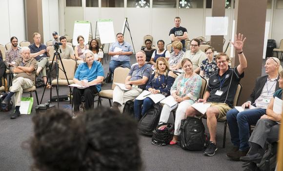 Fellow raising a hand at Fellowship training