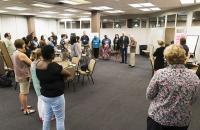 We Own It Fellows in a circle at Nashville training