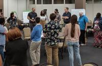 Fellows in a circle at training